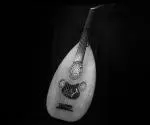 An oud is a stringed instrument with a pear-shaped body, a fretless neck, and a deep, resonant sound. The instrument plays a central role in Arabic, Persian, and Turkish music.