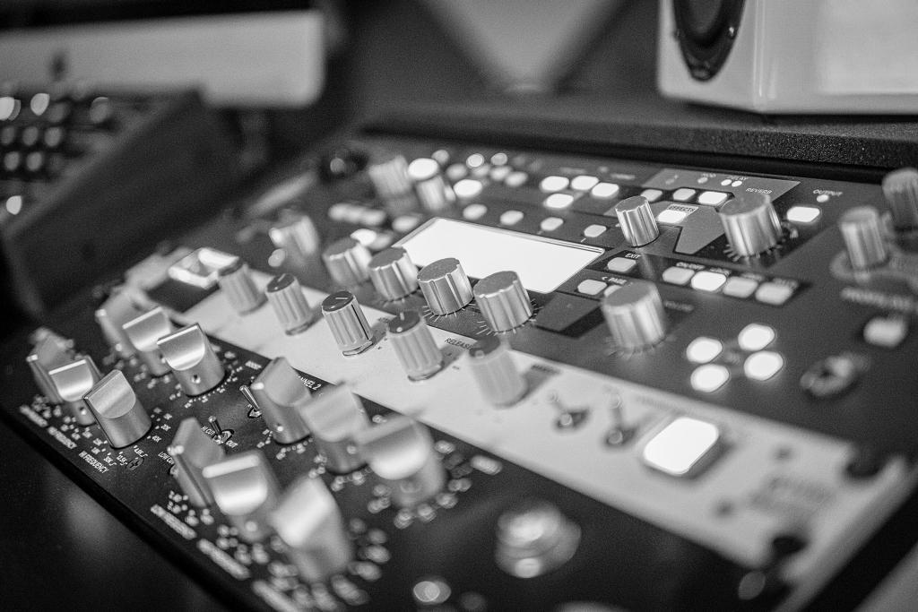 Mastering engineering is applying specialized audio processing to enhance a mix.