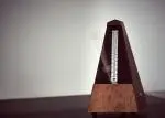 A metronome is a musical tool that provides a steady beat to help musicians play in time and maintain a consistent tempo.