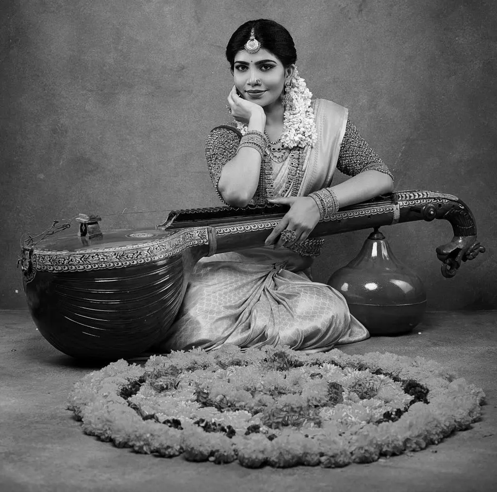 The Saraswati Veena is a traditional string instrument from Southern India with a large wooden resonator, hollow neck, brass frets and plucked steel strings played horizontally.