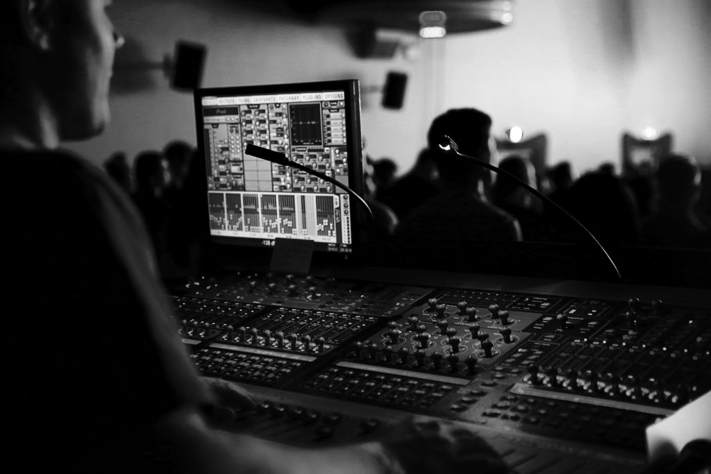 An audio engineer is a skilled professional who handles the technical aspects of recording, mixing, and reproducing sound using audio equipment and technology.